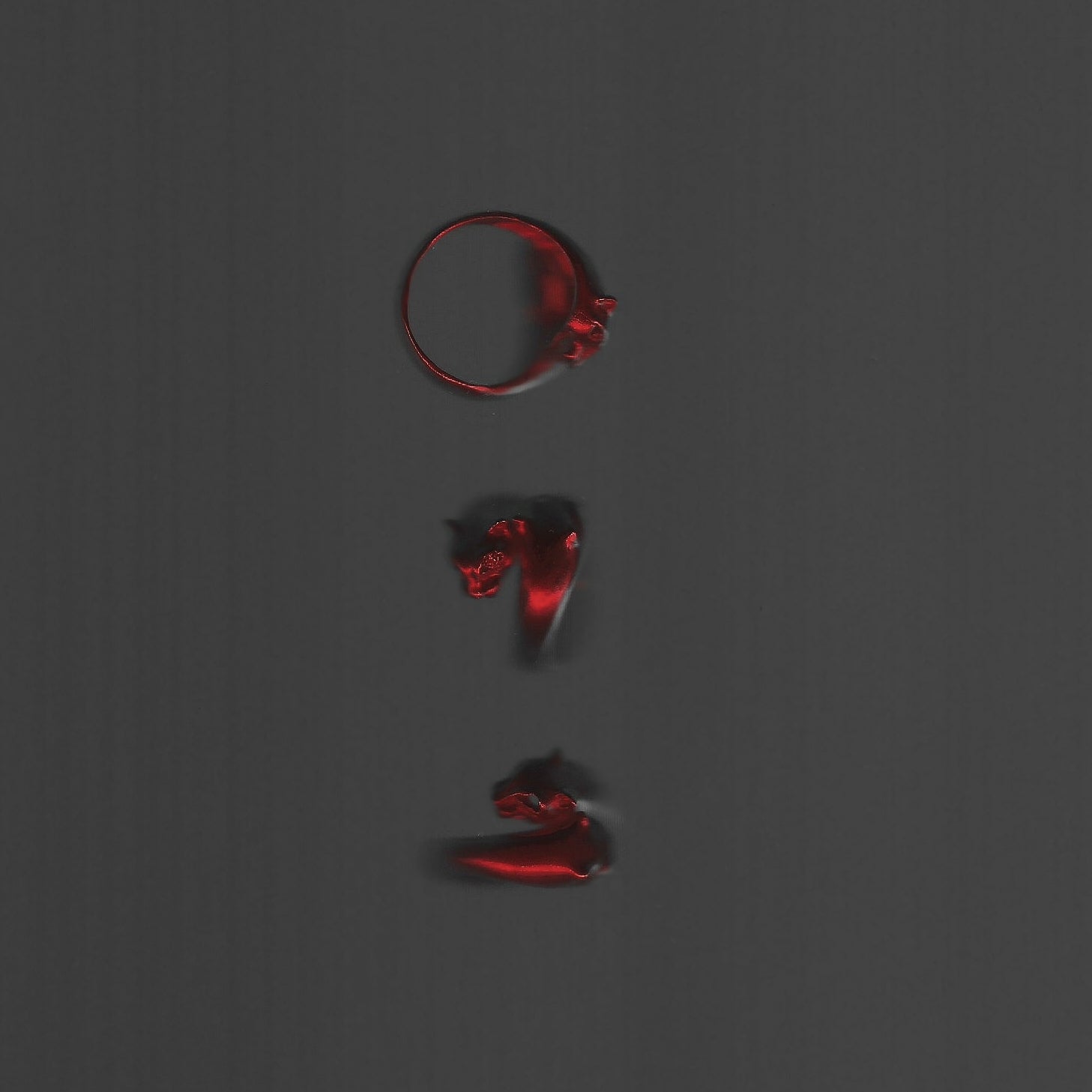 Two red rings on a dark gray background