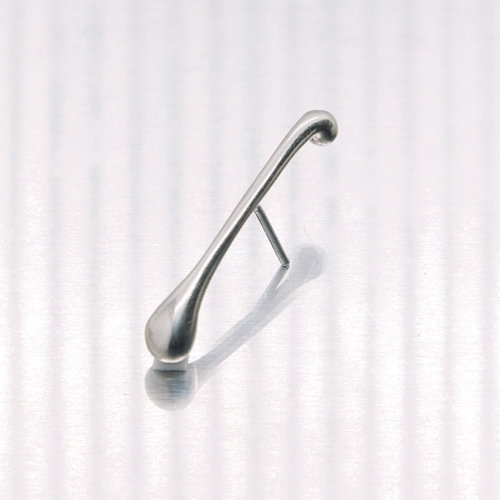 Metallic hook on a white background