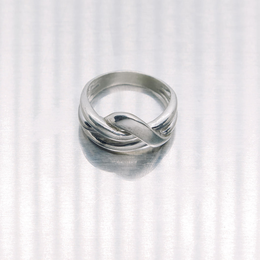 Silver ring on a white background