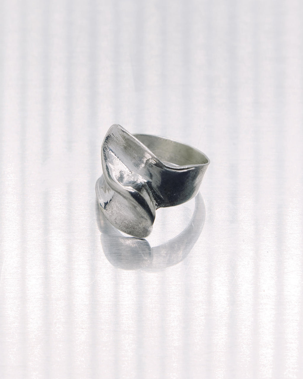 Silver ring on a white background