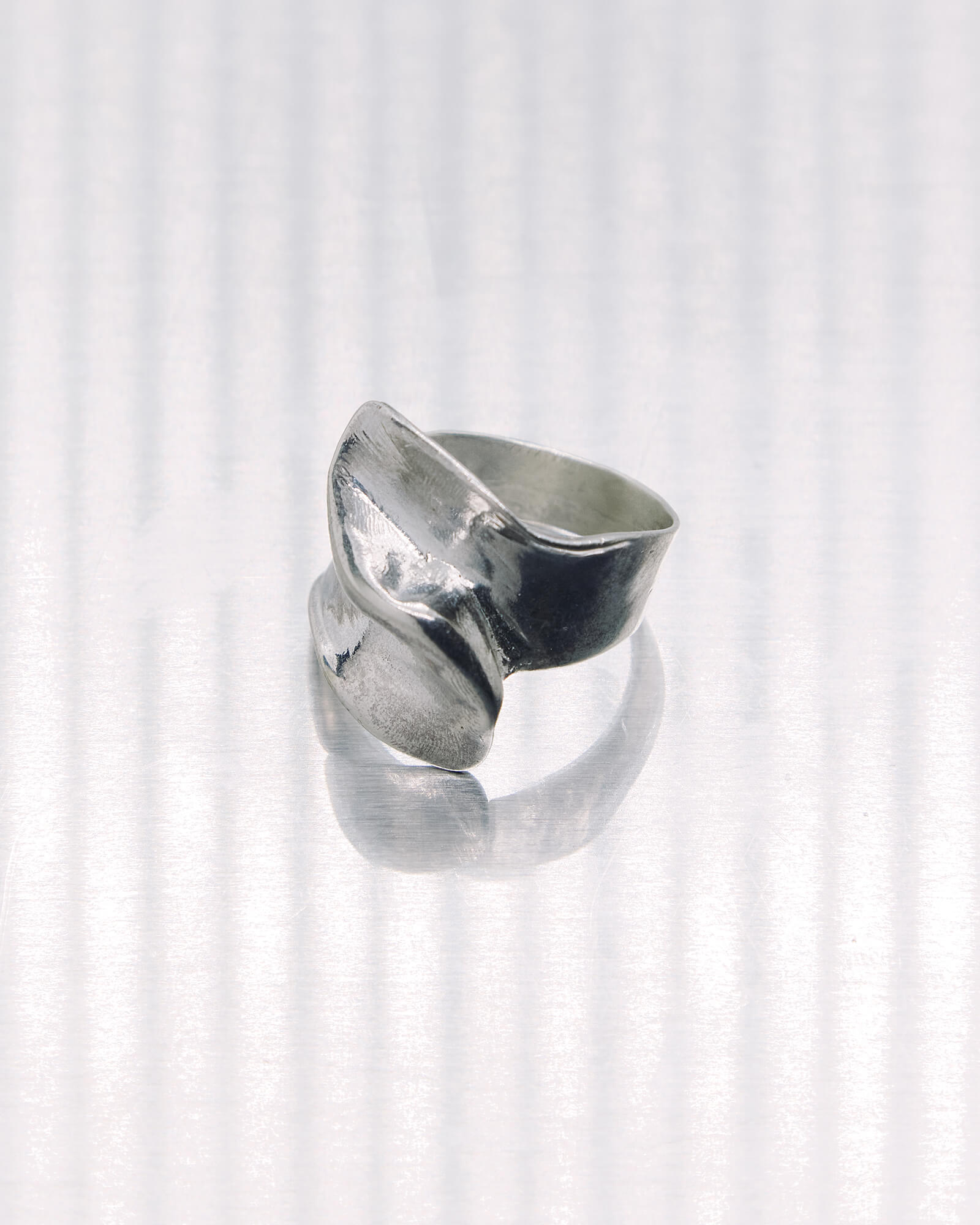Silver ring on a white background